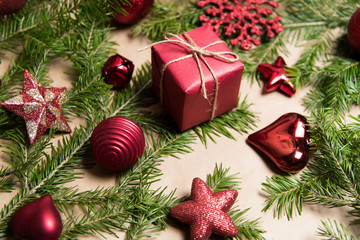 Christmas present wrapped in kraft paper with natural decoration