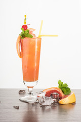 Orange cocktail in a tall glass