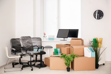 Moving boxes and different stuff in new office