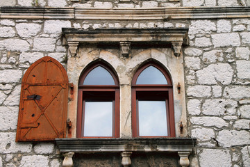 Old window on stone wall in Mostar , Bosnia and Herzegovina