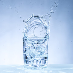 ice cube into a glass of water