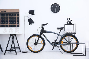 Modern living room interior with stylish bicycle