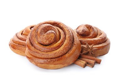 Sweet cinnamon rolls on white background