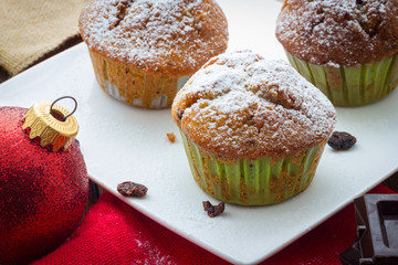 Muffins on a wooden table