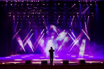 Singing man on concert stage