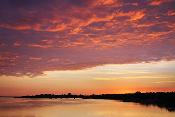 Fototapeta na wymiar Sunset at Gdansk bay in Jastarnia. Hel Peninsula. Poland