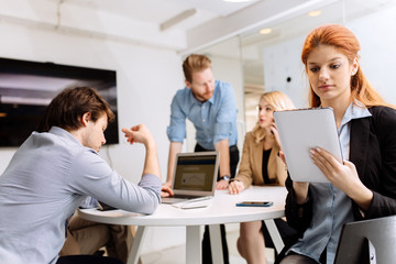 Group of business people working in office