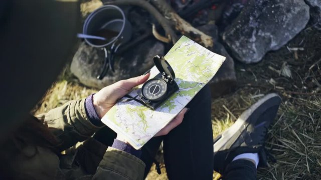 Crop tourist exloring map with compass