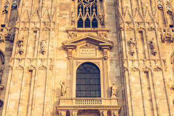 Fototapeta na wymiar detail of the facade of Milan Cathedral