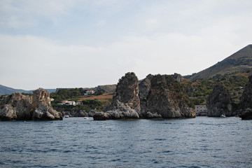 Fototapeta na wymiar Scopello, Italy - September 01, 2011: View of Scopello from the boat