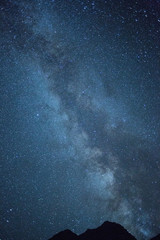 night landscape in the mountains. Starry sky
