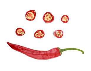 whole and sliced red chilli pepper