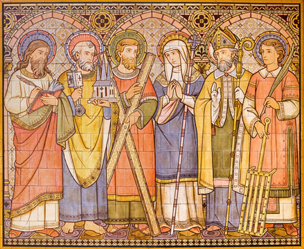 LONDON, GREAT BRITAIN - SEPTEMBER 15, 2017: The tiled mosaic of Apostles and saints in church All Saints designed by Butterfield and painted by Alexander Gibbs (1873).