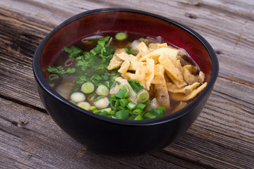 asian soup topped with wonton strips