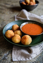 Arancini - traditional deep fried rice balls with meat and cheese