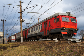 Fototapeta premium Passenger train rides along the route