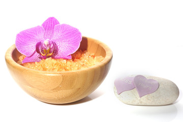 Orange bath salt in the bowl and a stone for Valentine's Day