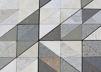 background of triangular marble stones each made with a differen