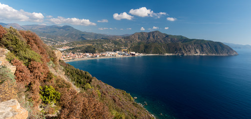 Obraz na płótnie Canvas Panoramic view of the Riviera di Levante, in Liguria; the small town along the coastline is Riva Trigoso