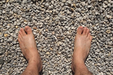 feet on stony ground