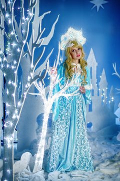 Russian Snow Maiden in blue suit and kokoshnik
