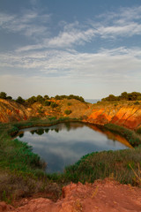 Fototapeta na wymiar Lake created from an abandoned Bauxite mine