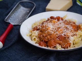 Pasta Bolognese Ragout witch Parmiggiano Cheese and Grater