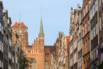 View of St. Mary's Church and old buildings on the St. Mary's Street (ul. Mariacka)  at the Main Town (Old Town) in Gdansk, Poland, in the morning.