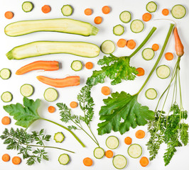 Vegetables pattern of fresh vegetables on white background. Carrots, zucchini.