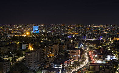 Fototapeta na wymiar Abdoun bridge and Amman mountains at night