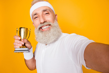 Body, health, care, champ, fit, leisure, training, workout, happiness, leadership, motivation, pride, success lifestyle. Emotional cool grandpa with reward, sign of respect, hero, strength, power