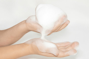 foam on hand isolated on white background