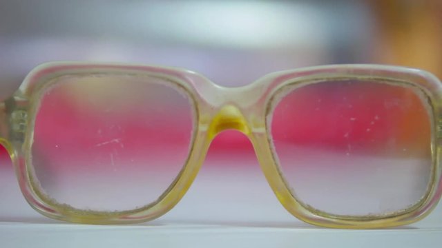 Close-up of spectacles on table
