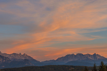 Amazing colorful clouds during autumnal sunset, Catinaccio/Rosengarten and Latemar, Alto Adige/South Tyrol, Italy