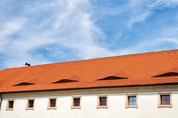 House roof with terracotta tiles in Prague, Czech Republic