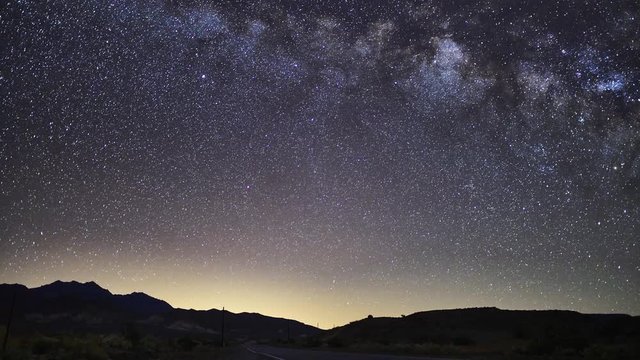 stars and milkyway time lapse shot in death valley national park