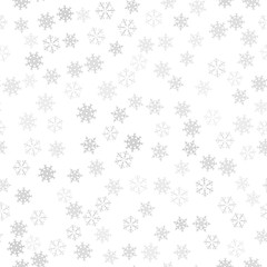 Seamless pattern. Christmas abstract background made of snowflakes on white. Design postcards, posters, greeting for the new year.