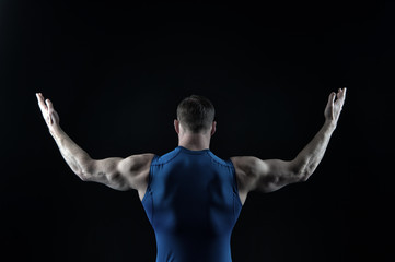 Fototapeta na wymiar Man with muscular body and back.