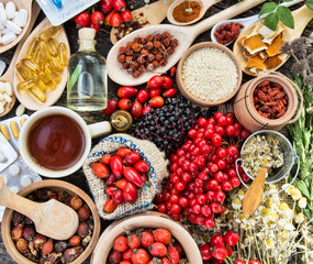 Medicinal tablets and pills and herbs composition: Dog rose, bunch branch Rosehips, types Rosa canina hips, essential oil. bunch, dried flowers of linden and chamomile elderberries and goji berries. 