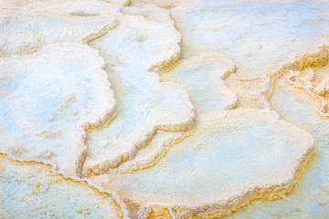 Abstract texture. Travertine pools, formations of a Terrace at Mammoth Hot Springs. Yellowstone Park, USA