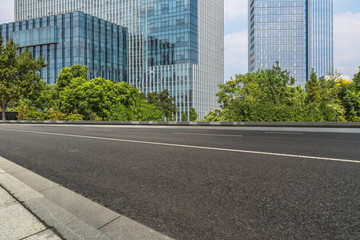Empty urban road and modern buildings