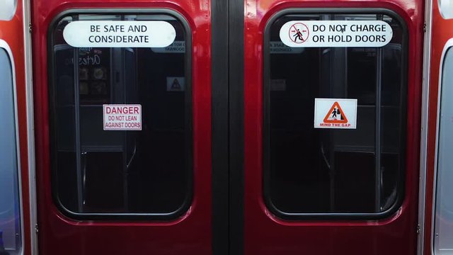 POV of the doors on a subway while travelling at high speeds