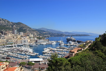 view of the port in Monaco with blue skies and water and boats