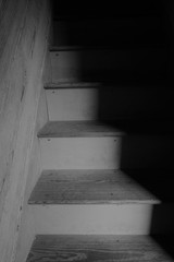 Wooden stairway in half light