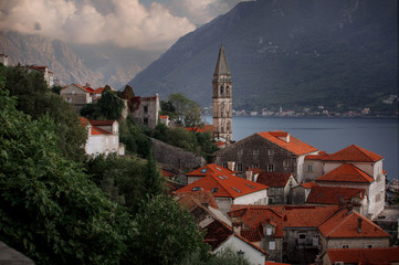 Amazing views of old town with church and house. Beautiful sky. Perast to Montenegro