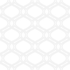 Seamless ornament. Modern background. Geometric pattern with repeating wavy silver lines