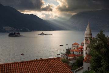 Fototapeta premium Amazing views of old town with church and house. Beautiful sky. Perast to Montenegro