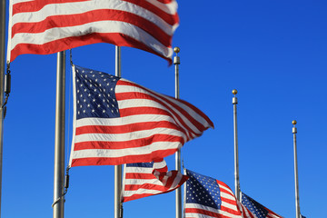 usa flag waving in the blue sky