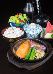 japanese cuisine. hot plate fish on the background