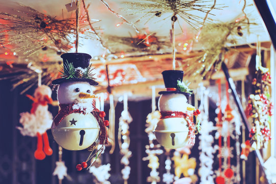 Snowman Toy Decoration In Christmas Market In European City By Night